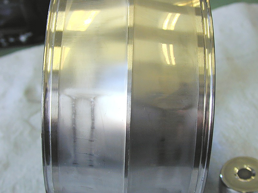 Độ mòn và mỏi bề mặt trong ổ trục lăn 33 abrasive wear in inner ring of spherical roller bearing fig1